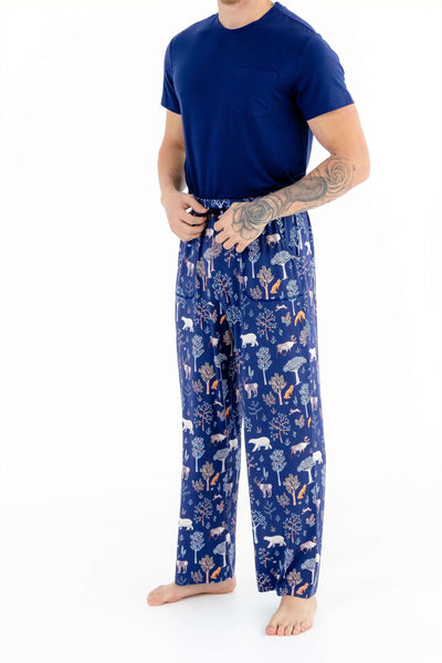 Front view of man wearing mens pajama set in Woodland Night print