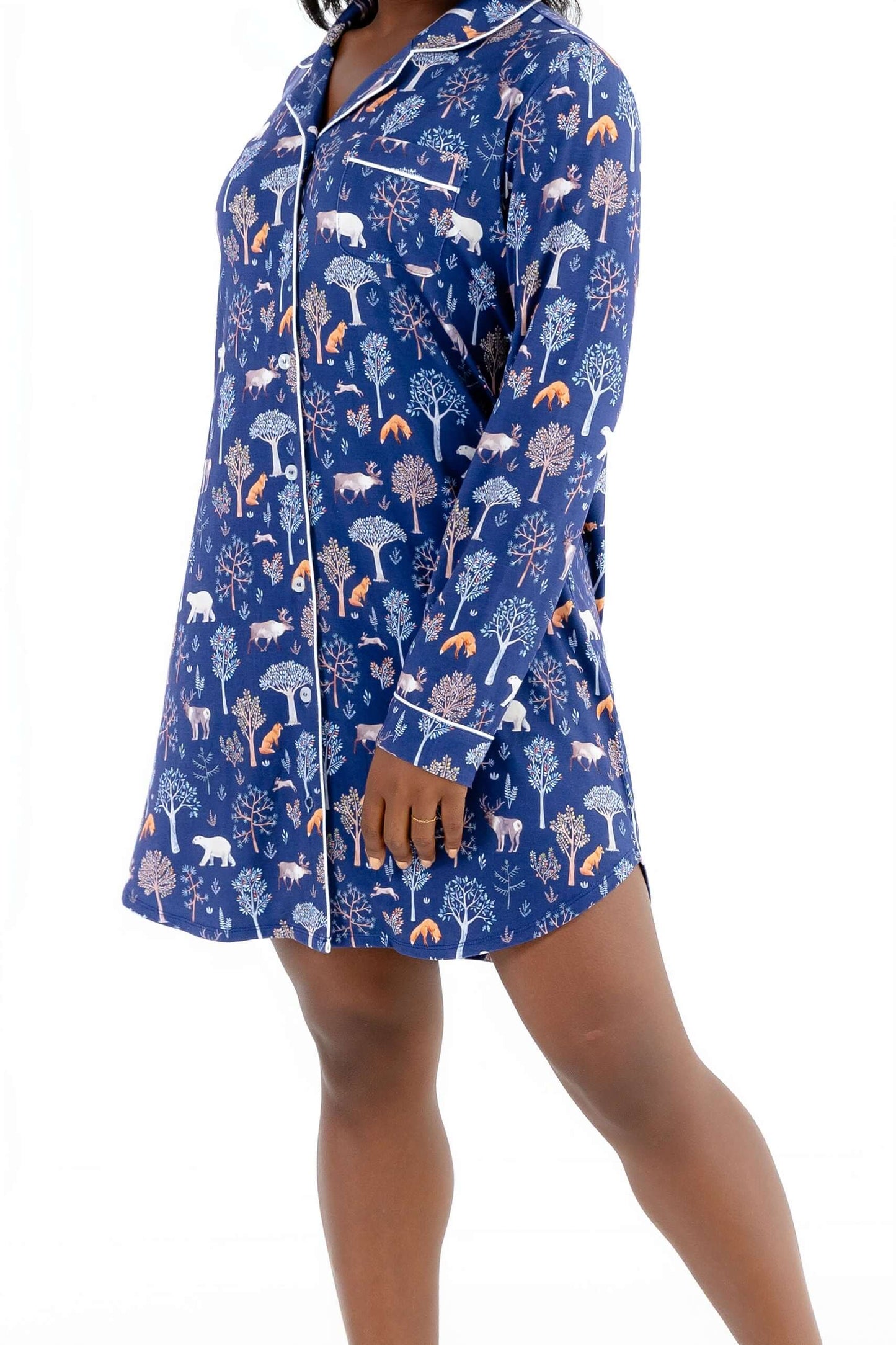 Woodland Night women nightshirt long sleeve in blue with forest and animal prints, featuring button-down front and notched collar.